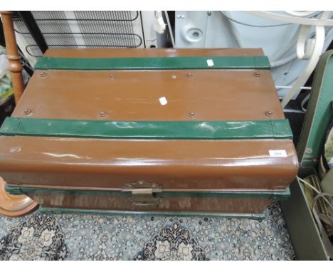 A traditional tin trunk, repainted