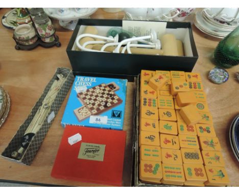 A collection of games including Carpet Croquet, playing cards and Mahjong set and scorers etc