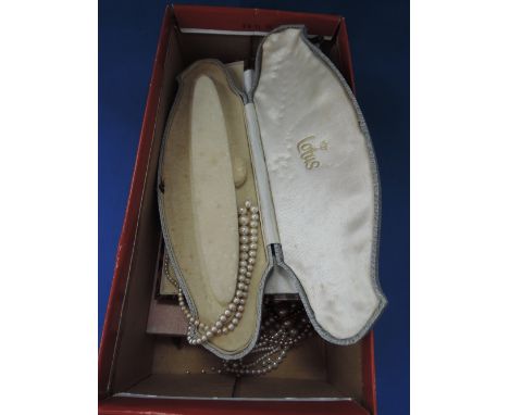 A selection of vintage simulated pearls including boxed