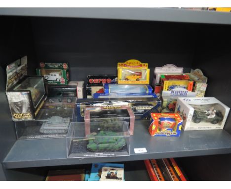 A shelf of mixed die-casts including Corgi, Siku etc, all boxed