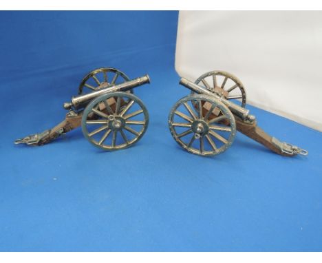 A pair of Bassett Lowke scale model brass cannons