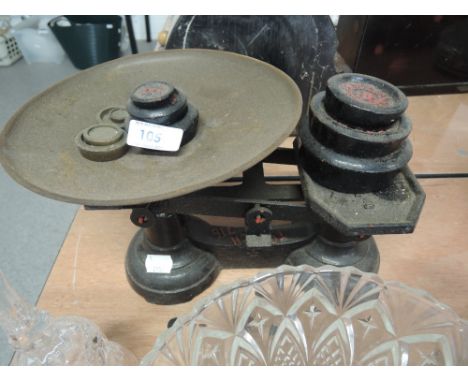 A set of vintage scales and weights