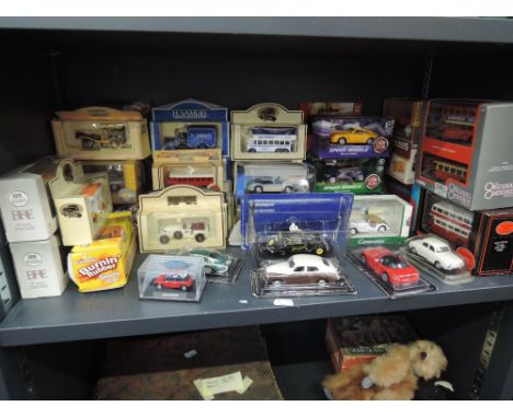 A shelf of mixed die-casts including EFE, Days Gone By, Cararama, all boxed 