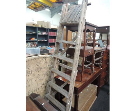A set of wooden step ladders