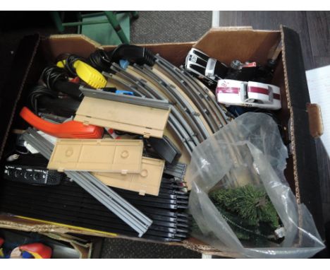 A box of modern Hornby and similar Scalextric cars, track, controllers etc