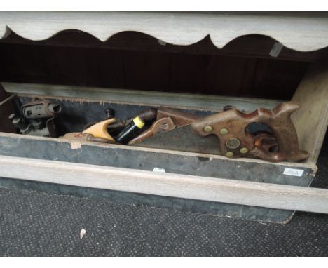 A traditional tool box and vintage tools