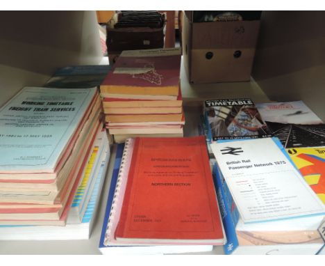 A shelf of late 20th century British Railways time tables etc