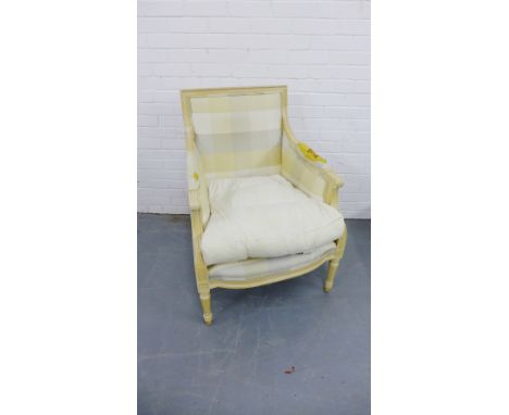 A contemporary arm chair having padded back support over cushion raised on turned supports (a/f) 