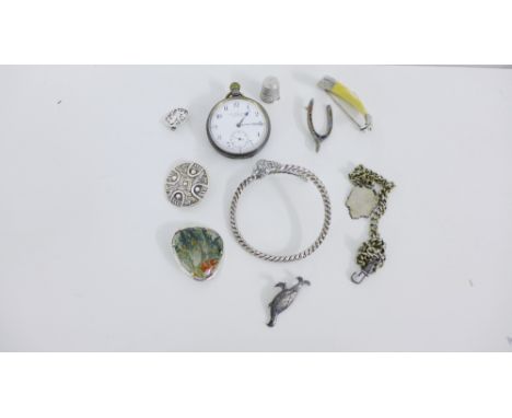 A mixed lot to include Scottish silver brooches, silver fob, pocket watch and a snake bangle, (a lot) 