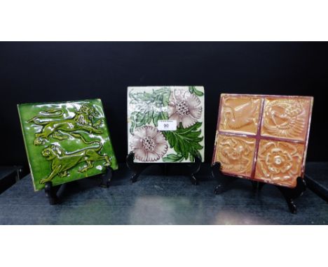 William de Morgan tiles to include Chelsea tile with carnation pattern, Fulham tile with flowers and red lustre glaze and a S