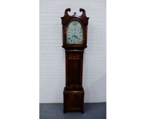 A 19th century mahogany cased long case clock by Alexander Innes of Dalkeith, having a swan neck pediment to hood over a shap
