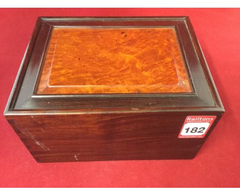 A Chinese hardwood box, having sliding lid with fielded burr panel, the box dovetailed. (7in x 5.5in x 4in)