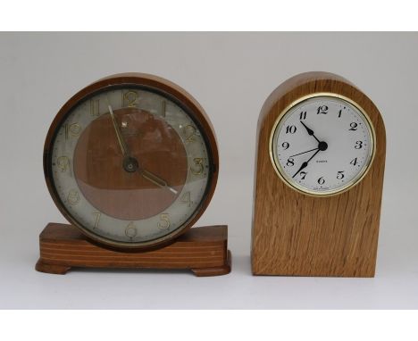 A new oak framed quartz German clock, from specialist wood working shop, and a Kunzle mantel clock, battery converted (2)
