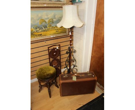 A collection of furniture comprising a mid 20th Century cake stand, Edwardian piano, a 1950's suitcase, Edwardian telescopic 