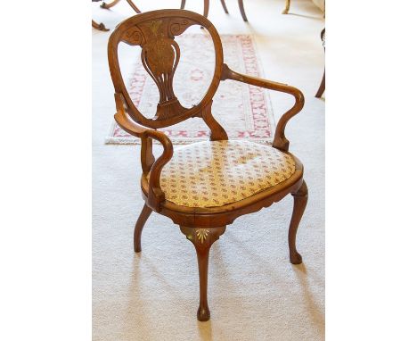 A Victorian brass inlaid rosewood open armchair, circa 1860, the ovoid back with vase splat inlaid with scrolling foliage and