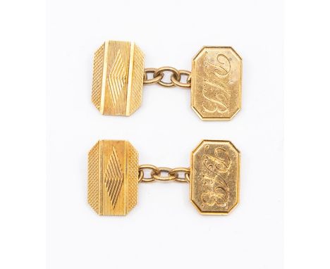 A pair of 9ct gold cufflinks, rectangular with engine turned decoration on one link and P.A.B on the other, weight approx 7gm