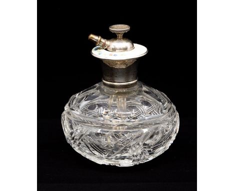 A cut glass and silver enamelled atomiser, Adie Bros, Birmingham 1938, white guilloche enamel lid with painted floral decorat