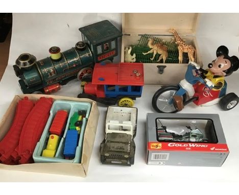 Vintage Toy collection comprising Masudaya of Japan battery operated Western Locomotive,M Minic &nbsp;clockwork Bus, Marx bat