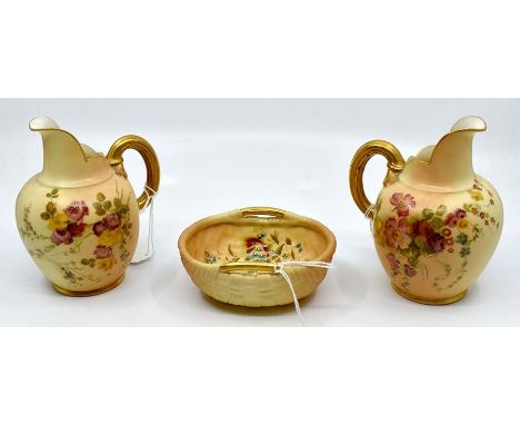 A pair of Royal Worcester blush ivory mantle vases, gilt handles, floral design, along with blush ivory basket bowl