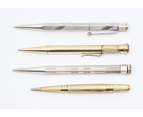 A collection of 20th Century four pencil holders including: Edward VIII engine turned, by Johnson, Matthey & Co, London, 1937