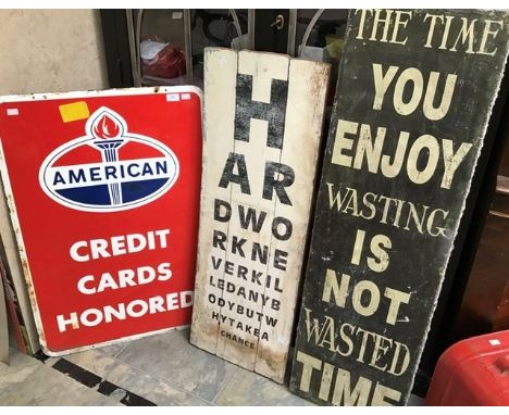 A collection of assorted enamel and various signs to include: 'American Credit Cards Honored' two-sided sign; My Garage sign;