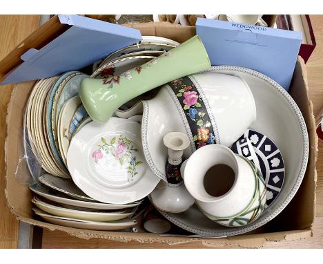 A collection of china and ceramic wares, mostly 20th Century including bedroom wash sets, plates, cups, commemorative mugs et