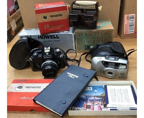 A collection of assorted cameras, including Viewmaster and sliders, Bell and Howell Flashgun, Nikon camera etc, Pentax camera