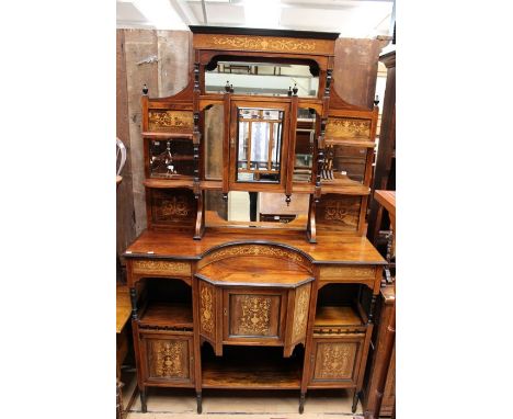 A Victorian Aesthetic rosewood and marquetry inlaid chiffonier, mirrored back, having a projecting single glazed door to cent