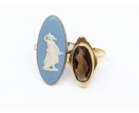 A 9ct gold black onyx ladies dress ring, ring size K, total gross weight 3.96 grams, plus a sterling silver Wedgwood, dress r