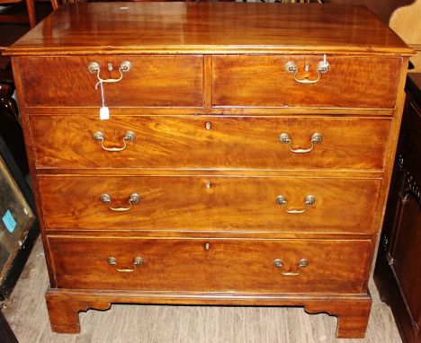 A George III mahogany chest of drawers, comprising two short over three long graduated drawers, raised on bracket feet