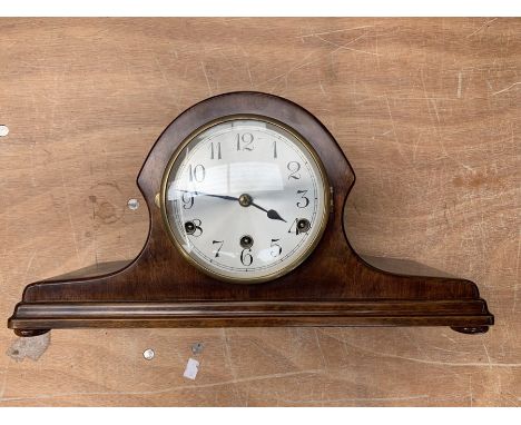 A collection of seven early to mid 20th Century oak and mahogany mantel clocks, mostly with eight day movements, some with We