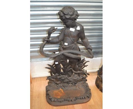 A figure of a boy wrestling a snake designed into a stick stand with drip tray, late 19th Century, made from cast iron, good 