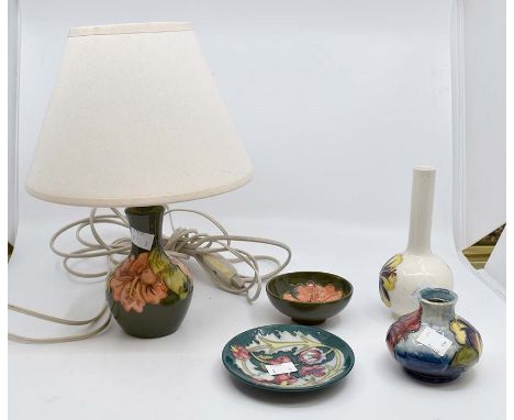 A small 20th Century Moorcroft lamp, two pin dishes, small posy vase and another, lots of crazing but no chips or cracks pres