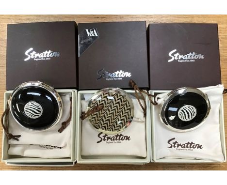Three Stratton compacts, comprising double mirrors and a convertible compact, complete with presentation boxes and sleeves, f
