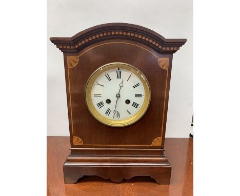 Four various mantel clocks, including an Edwardian eight day mantel clock with a white dial and inlaid decoration, an Art Dec