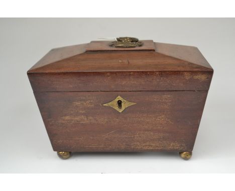 A mid 19th Century mahogany tea caddy, with two fitted compartments, brass mount