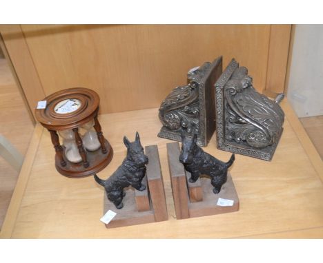 Two pairs of book ends, Scottie Dog and a Regency style along with an early sand timer in mahogany caseCR: The Regency style 