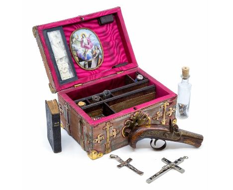 Vampire slaying kit. Velvet-covered box with brass mounts, carrying handle, lock and key; lined with crimson silk; sectional 