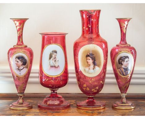 &nbsp;A group of four Bohemian ruby and overlay glass portrait vases, circa 1890-1910, including a pair of amphora shape, 29.