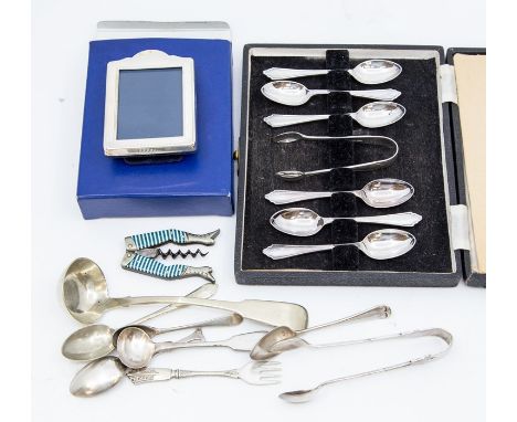 A modern silver photo frame, a collection of assorted silver plated flatware, set of coffee spoons, etc