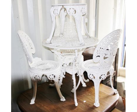 A Victorian style aluminium white painted garden suite, comprising a table, three chairs and a matching stool (5)