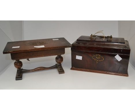 A 19th Century rose mahogany tea caddy with brass swing handle and key, along with an 18th Century style table music box with