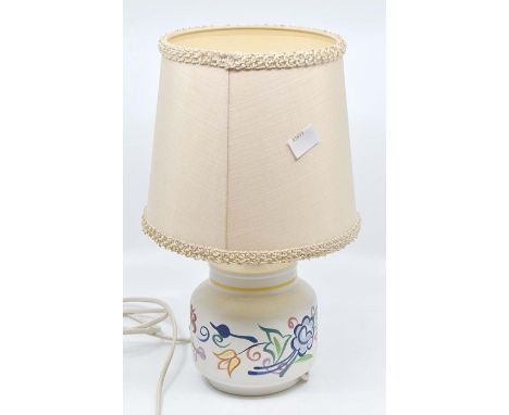 A circa 1970's Poole Pottery table lamp with shade