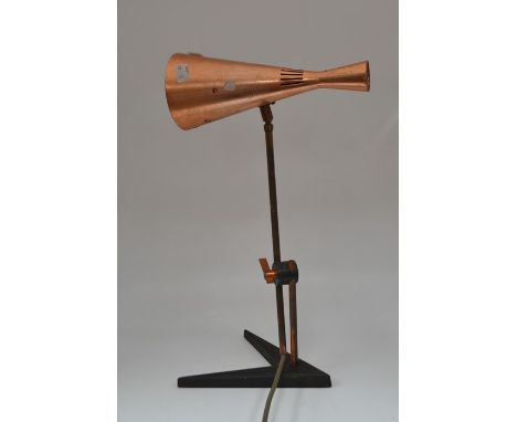 A late 1960's vintage copper adjustable desk lamp on iron base