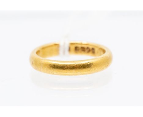 A 22ct gold wedding band approx 3.5mm wide, size K, weight approx 5gms&nbsp;