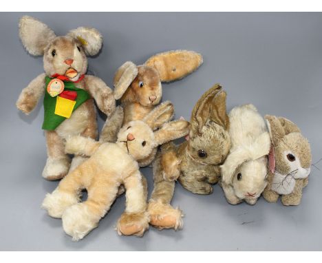 A collection of mostly Steiff soft toy rabbits Condition:- Ossili - a little faded and dirty, retains cloth tag, button and o