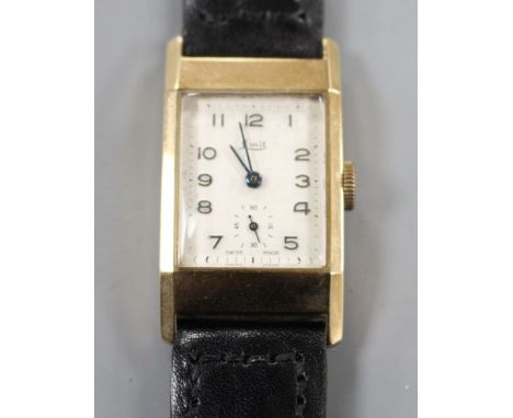 A gentleman's late 1950's 9ct gold Limit manual wind wrist watch, with rectangular Arabic dial and subsidiary seconds, on ass