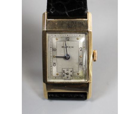 A gentleman's 1940's 9ct gold Buren manual wind wrist watch, with rectangular Arabic dial and subsidiary seconds, on associat