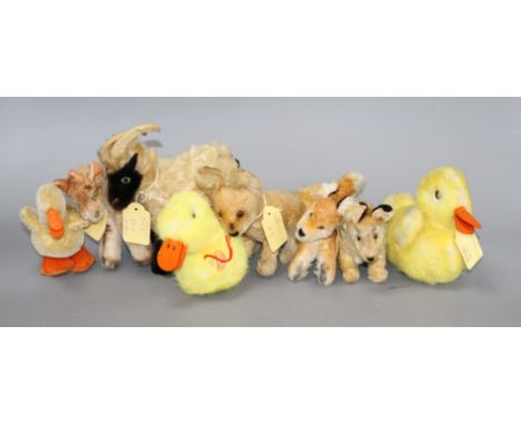 Eight assorted vintage Steiff farm animals Condition:- Snucki mountain goat - worn to one side, a little faded, no button or 