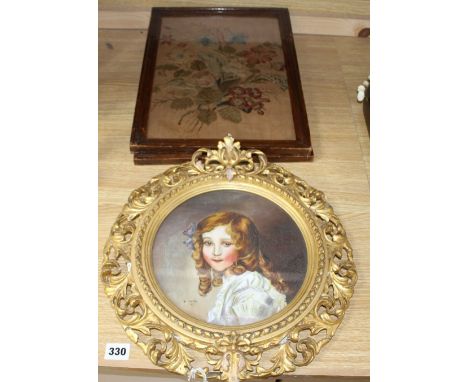 A gilt framed oil portrait of a young lady signed E. Reilly, diameter 22cm, overall 40cm, and two woolwork floral panels, 37 